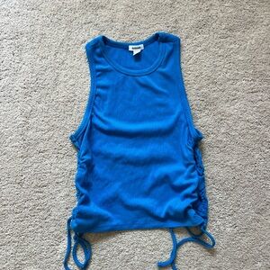 Garage high neck tank with circle cut out on side. Size small in cobalt blue